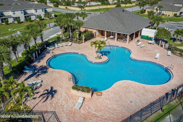 view of swimming pool with a patio area