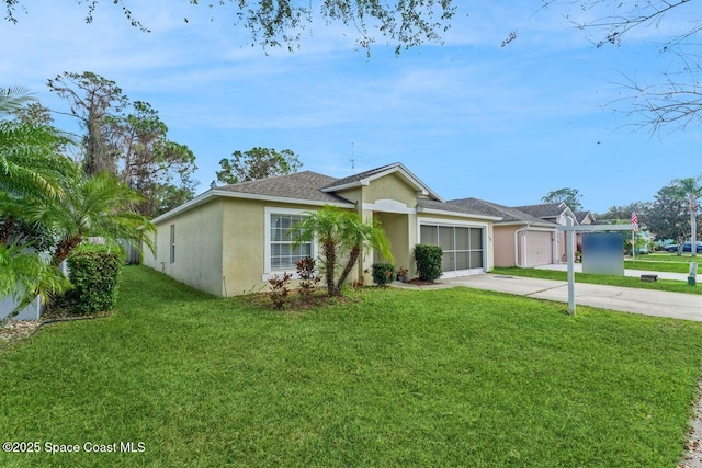 ranch-style home featuring a garage and a front yard