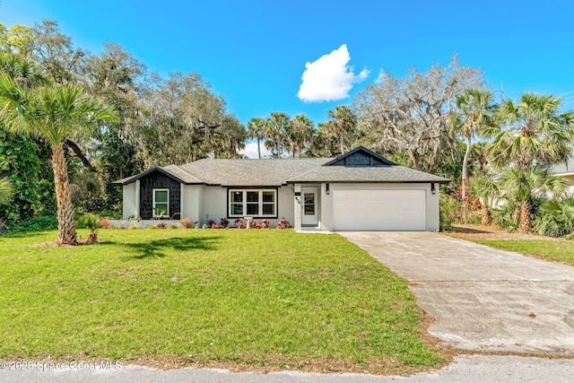 single story home featuring a front yard and a garage