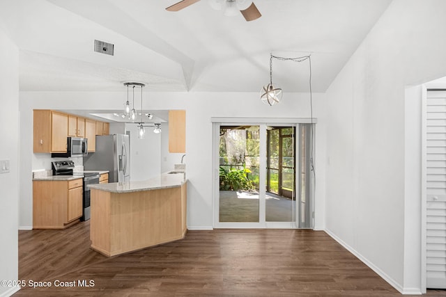 kitchen with hanging light fixtures, stainless steel appliances, light brown cabinetry, and kitchen peninsula