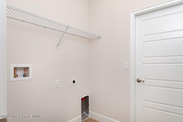 laundry room with washer hookup and electric dryer hookup