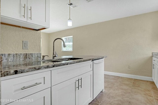 kitchen with dishwasher, white cabinets, hanging light fixtures, and sink