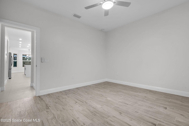 empty room featuring ceiling fan