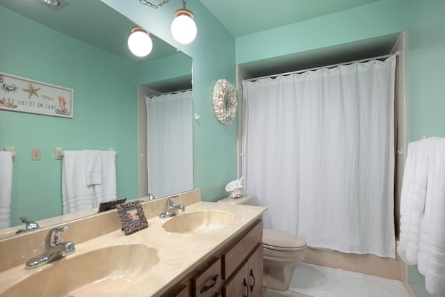 full bathroom featuring shower / bathtub combination with curtain, tile patterned flooring, vanity, and toilet