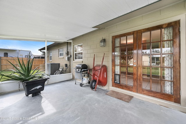 view of patio / terrace with area for grilling and french doors