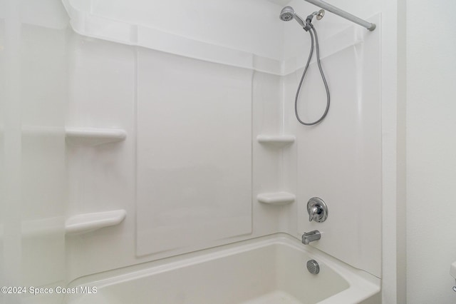 bathroom featuring  shower combination