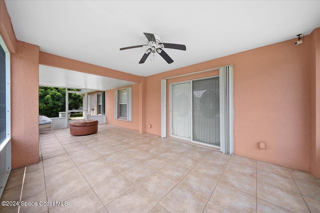 view of patio with ceiling fan