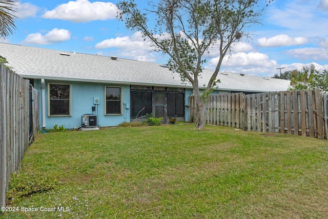 view of yard featuring central AC