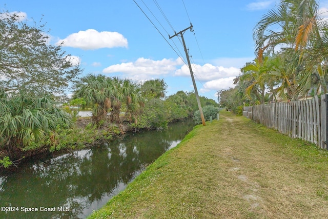 view of yard with a water view