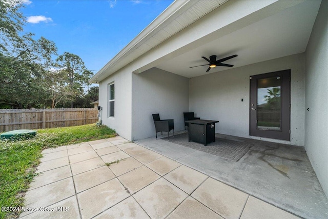 view of patio with ceiling fan