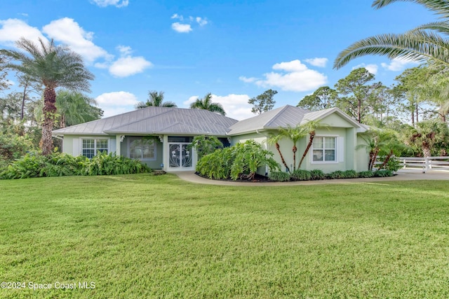 single story home with a front lawn