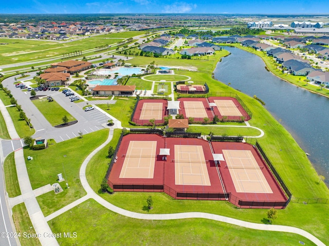 drone / aerial view with a water view