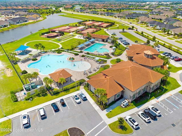 bird's eye view with a water view