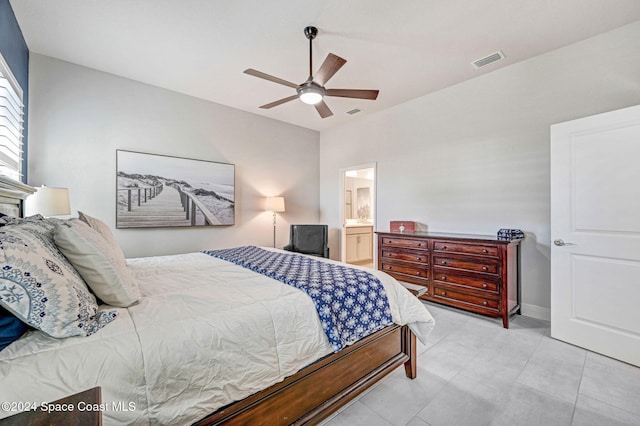 bedroom with ensuite bathroom and ceiling fan