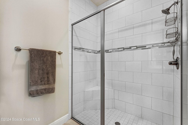 bathroom with an enclosed shower