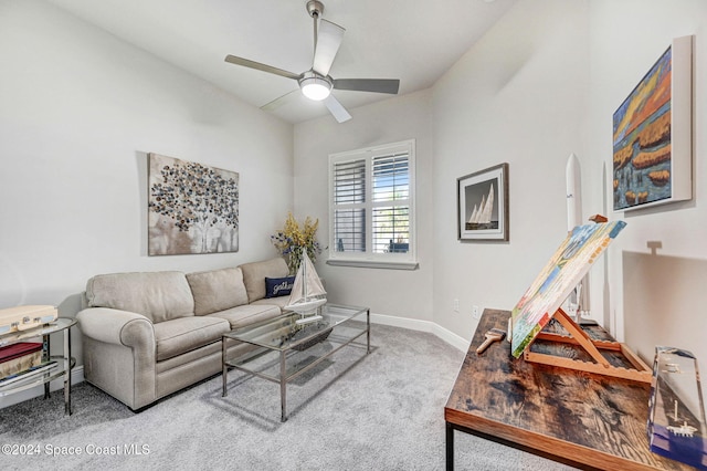 living room with carpet and ceiling fan