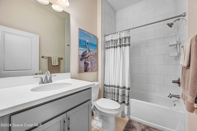 full bathroom featuring tile patterned floors, vanity, shower / bathtub combination with curtain, and toilet