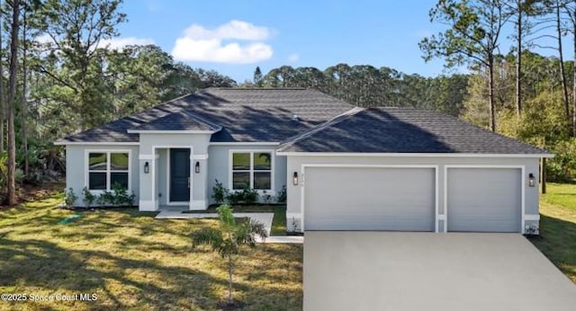 single story home with a garage and a front lawn