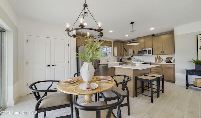 dining area featuring an inviting chandelier