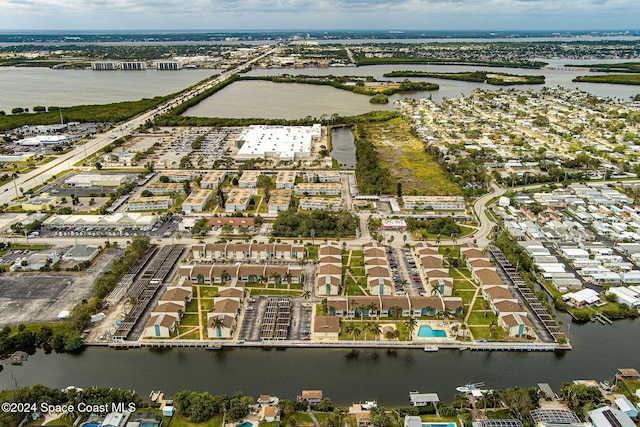 bird's eye view with a water view