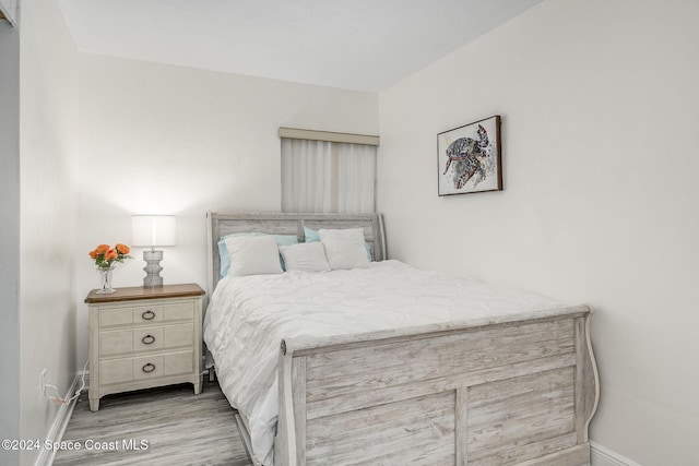 bedroom featuring light wood-type flooring