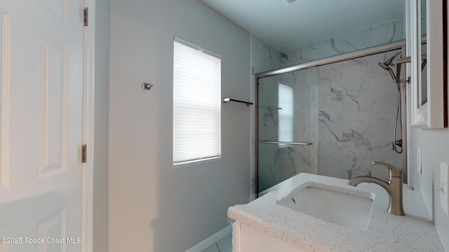 bathroom featuring vanity and a shower with door