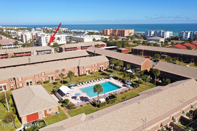 birds eye view of property featuring a water view