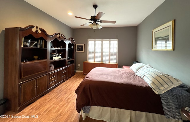 bedroom featuring ceiling fan and light hardwood / wood-style floors