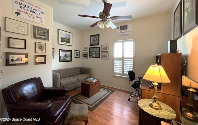 office space with ceiling fan and wood-type flooring