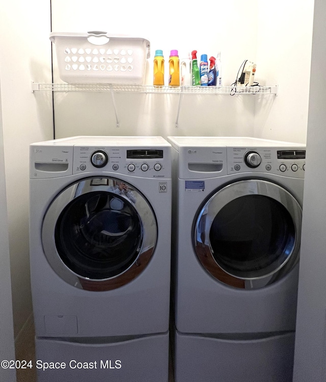 laundry area featuring washing machine and dryer