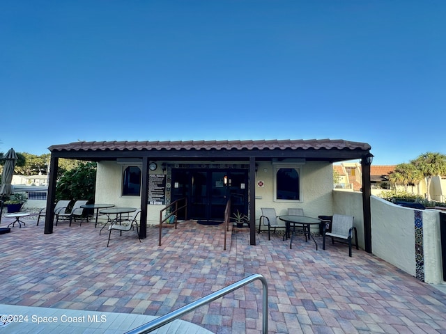 back of house featuring a patio