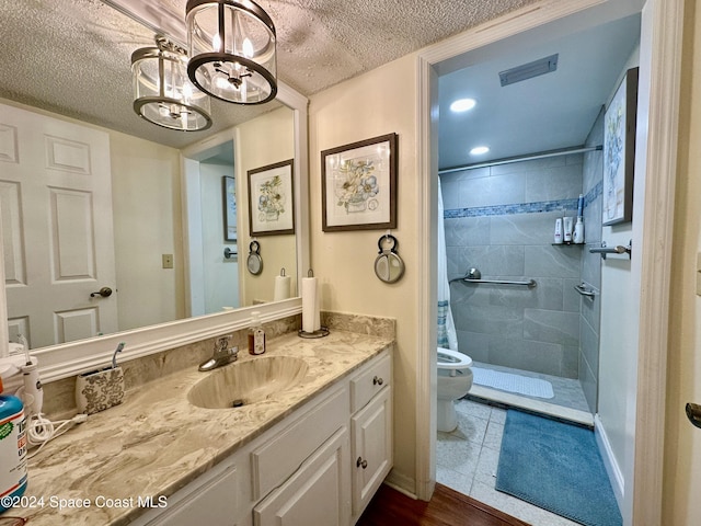 bathroom featuring a shower with shower curtain, a textured ceiling, tile patterned floors, and toilet