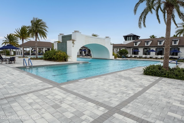 view of pool with a patio