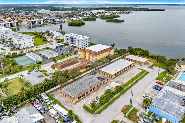 bird's eye view with a water view