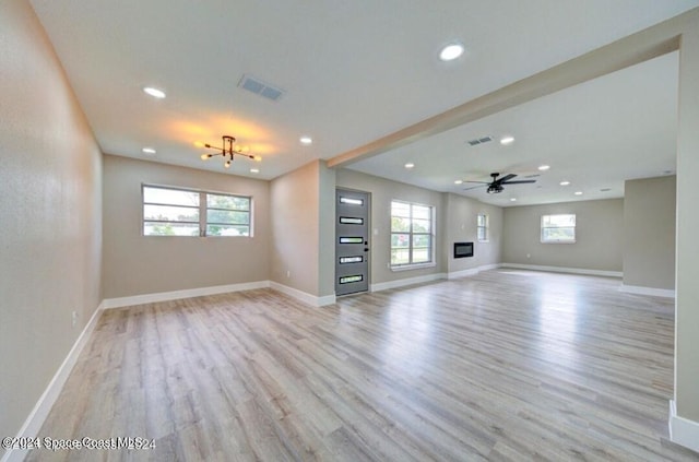 interior space featuring light hardwood / wood-style floors and ceiling fan