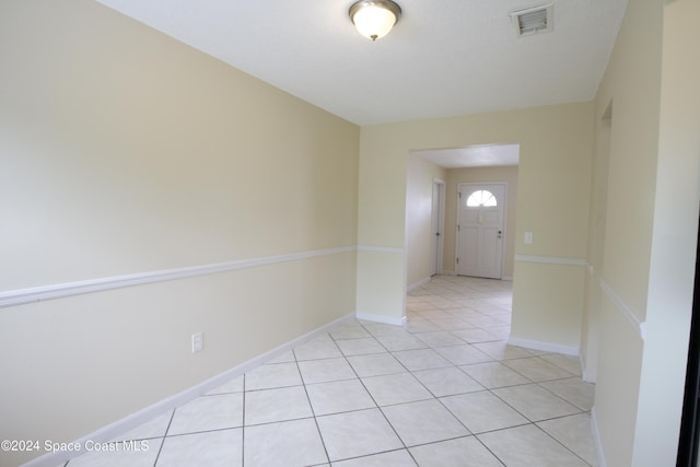 entrance foyer with light tile patterned floors