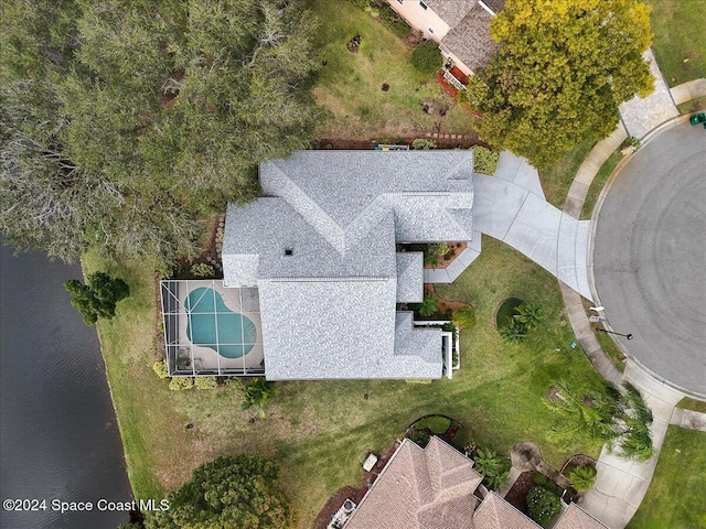 drone / aerial view with a water view