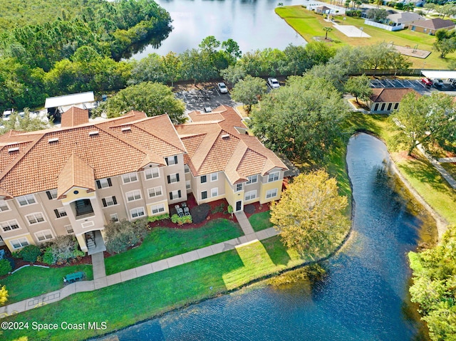 drone / aerial view with a water view