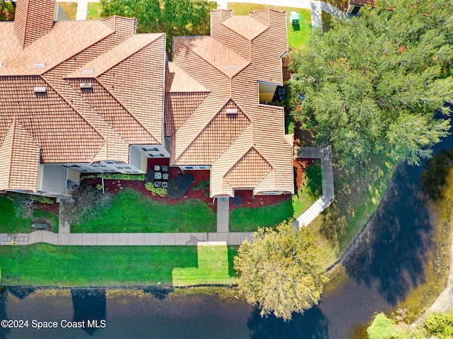 drone / aerial view featuring a water view