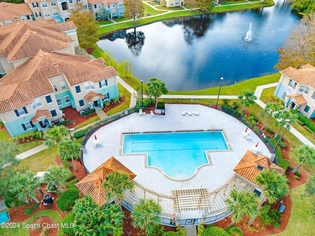 birds eye view of property featuring a water view