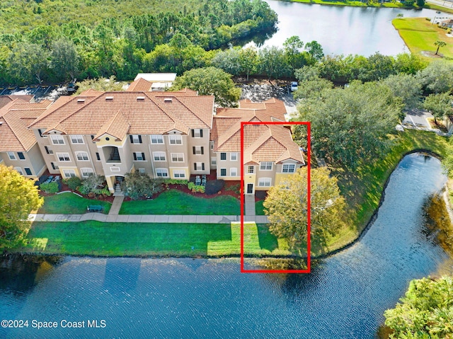 birds eye view of property featuring a water view