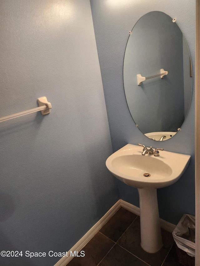 bathroom featuring tile patterned flooring