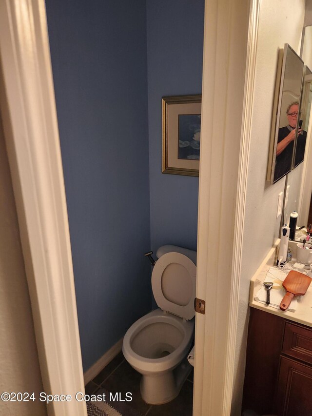 bathroom featuring tile patterned floors and toilet