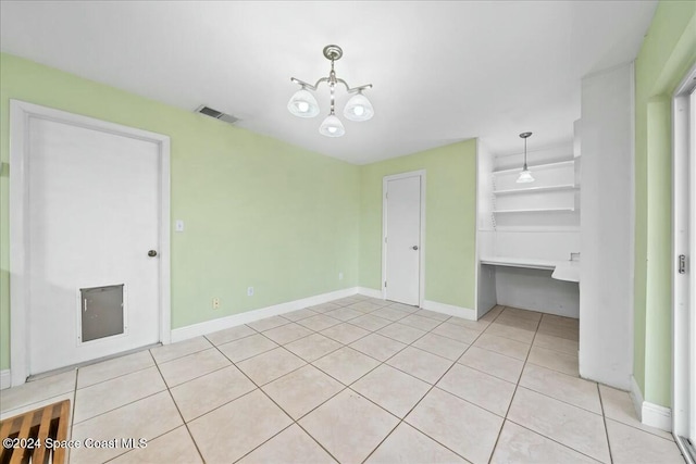 unfurnished bedroom featuring light tile patterned flooring