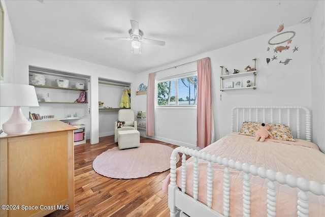 bedroom featuring hardwood / wood-style flooring and ceiling fan