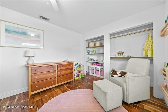 living area with dark wood-type flooring