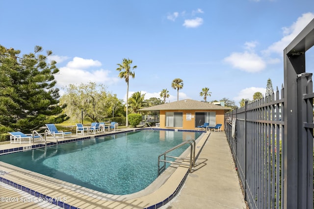 view of swimming pool with a patio area