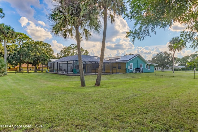 view of yard with a lanai