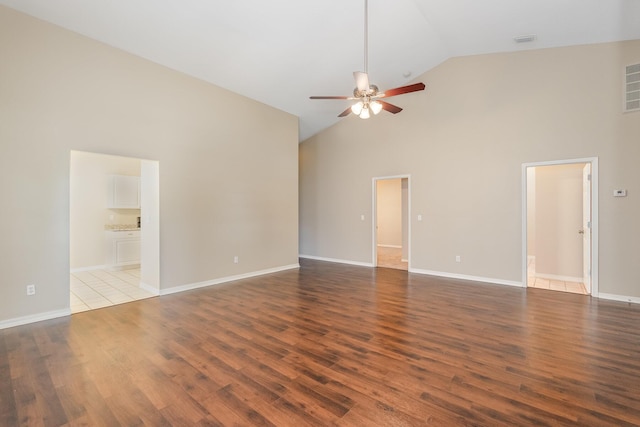 867 S Patrick Dr, Satellite Beach, FL 32937 - unfurnished room featuring high vaulted ceiling, ceiling fan, and wood finished floors