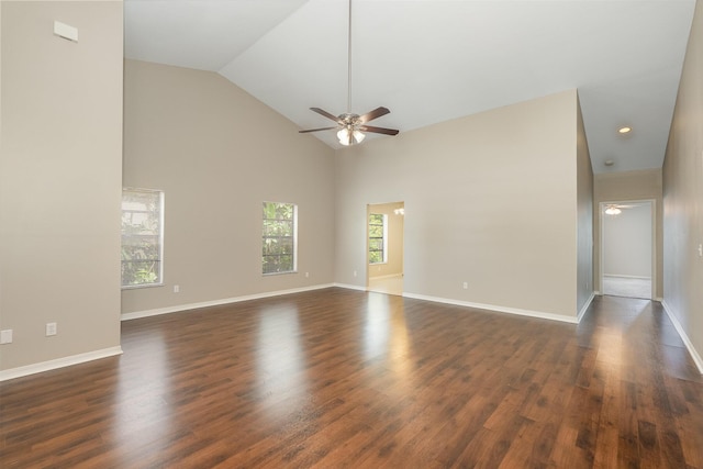 867 S Patrick Dr, Satellite Beach, FL 32937 - empty room featuring a ceiling fan, high vaulted ceiling, and dark wood-style floors